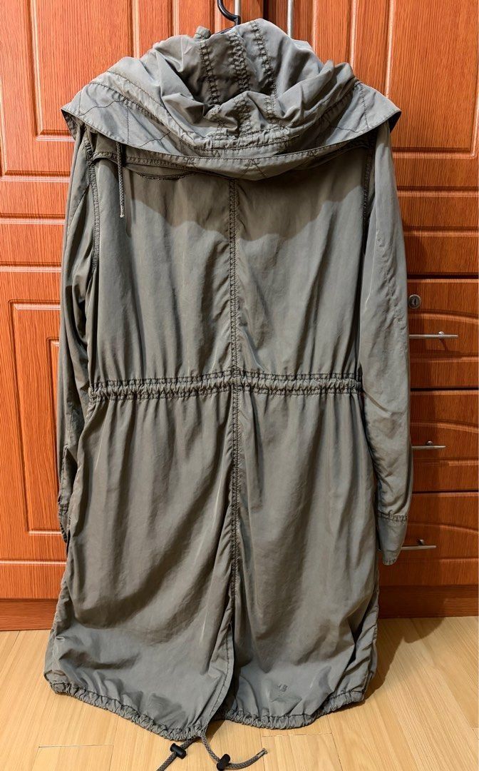 Tommy Hilfiger Parka Jacket with Hood Small - Large (Category: Coats, Jackets and Outerwear) located in Quezon City. Submitted by garagesale2026 (Listing ID 1464337557, Image 2). Description: - Preloved - In good condition - Runs big, S on tag, fits up to Large - Color: Olive - Length: Below knee for 5'4" tall - Removable hood; Drawstring at waist and hem; Button and zip closure; With cotton lining - Lightweight material.