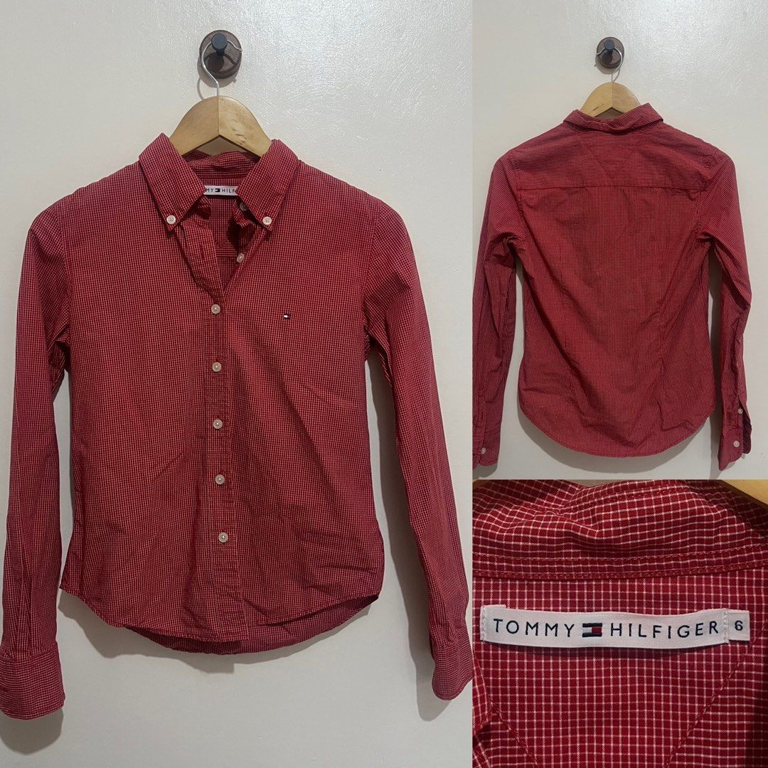 Tommy Hilfiger Red Gingham Button-Up Shirt Size 6 (Category: Blouses) located in General Santos City (Dadiangas). Submitted by dresswithaly (Listing ID 1464220491, Image 1). Description: - Brand: Tommy Hilfiger - Style: Long-sleeved button-up shirt - Pattern: Classic red and white gingham - Features: Button-down collar, embroidered flag logo on chest - Size: Tag shows 6 - Occasion: Great for casual or smart-casual wear.