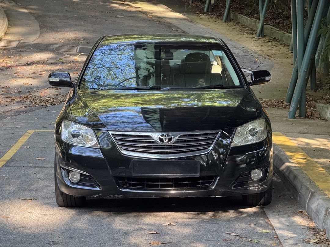 Toyota Camry 2.4 (A) (Category: Used Cars) located in Singapore. Submitted by quickphoenix_573035 (Listing ID 1464173442, Image 1). Description: The car is in excellent condition, jet black with striking BBS sports rims. Powerful and responsive. Gearbox and steering system were recently overhauled. High-powered sound system. Android dashboard screen managing audio, navigation, Google Maps and hands-free calls. Very low depreciation and running co