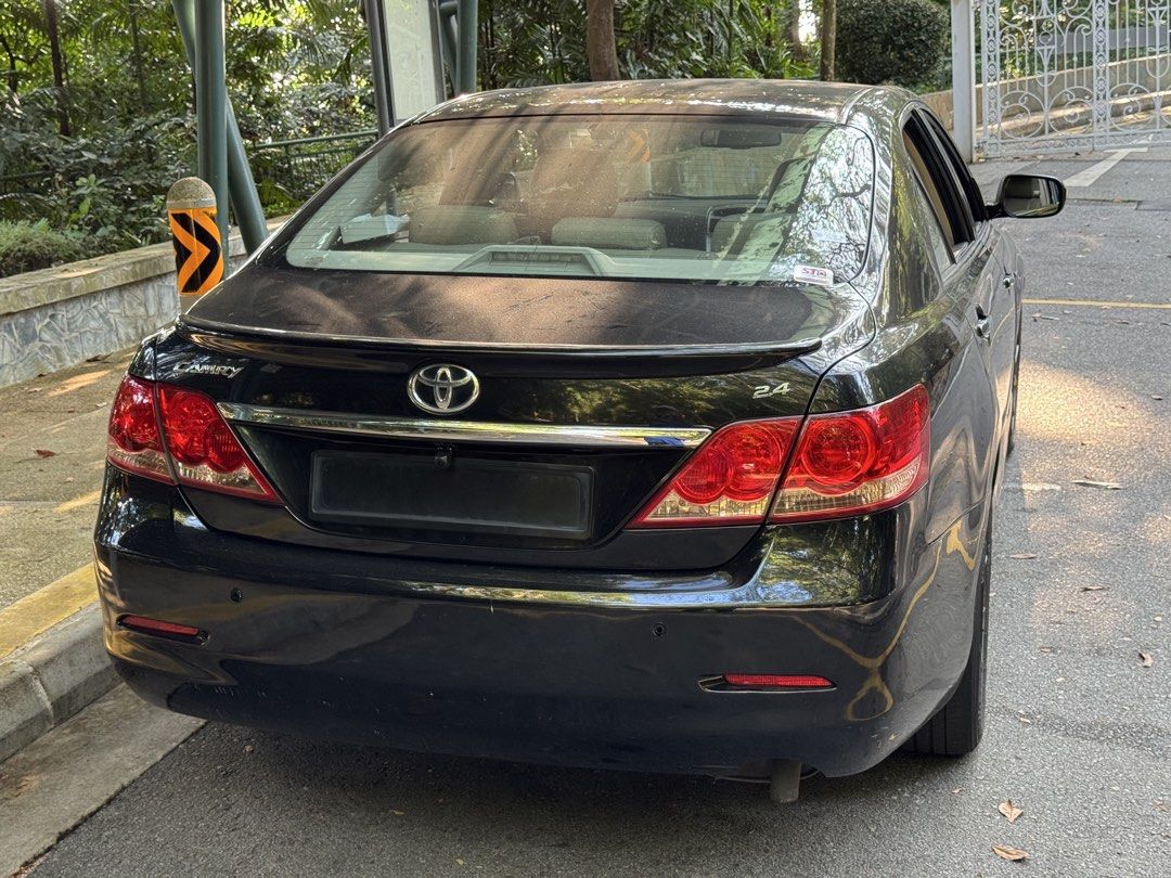 Toyota Camry 2.4 (A) (Category: Used Cars) located in Singapore. Submitted by quickphoenix_573035 (Listing ID 1464173442, Image 3). Description: The car is in excellent condition, jet black with striking BBS sports rims. Powerful and responsive. Gearbox and steering system were recently overhauled. High-powered sound system. Android dashboard screen managing audio, navigation, Google Maps and hands-free calls. Very low depreciation and running co