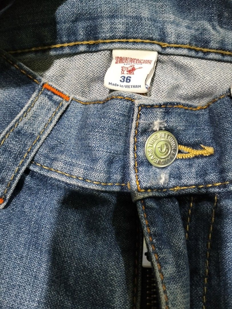 True Religion Distressed Flared Jeans Size 36 (Category: Jeans) located in Taguig. Submitted by conniemdcruz (Listing ID 1464258765, Image 3). Description: - Brand: True Religion - Size: 36 - Style: Flared leg - Condition: Distressed with rips and patches - Wash: Classic blue denim - Perfect for: Casual outfits - Please check photos for detailed condition. True religion Baggy pants 36 on tag 38 on tape Length 45 Leg opening 8.5 Excellent conditio