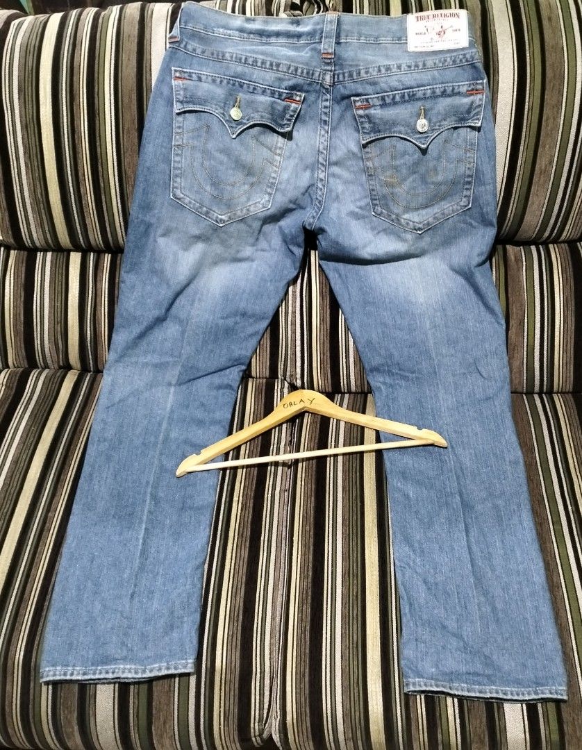 True Religion Distressed Flared Jeans Size 36 (Category: Jeans) located in Taguig. Submitted by conniemdcruz (Listing ID 1464258765, Image 2). Description: - Brand: True Religion - Size: 36 - Style: Flared leg - Condition: Distressed with rips and patches - Wash: Classic blue denim - Perfect for: Casual outfits - Please check photos for detailed condition. True religion Baggy pants 36 on tag 38 on tape Length 45 Leg opening 8.5 Excellent conditio