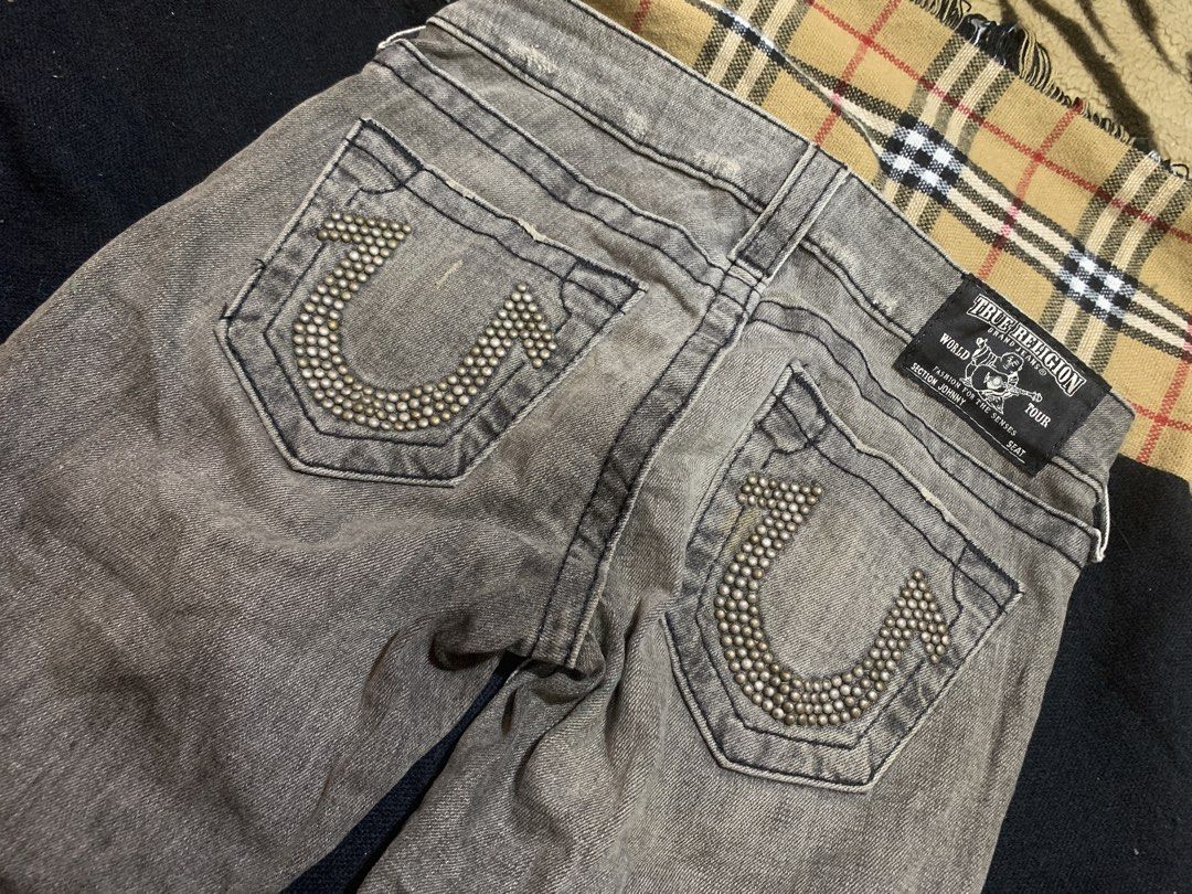 True Religion Grey Jeans with Studded Pockets (Category: Jeans) located in Cagayan de Oro. Submitted by chabermz (Listing ID 1464307841, Image 3). Description: - Authentic Grey True Religion Jeans - Size: 28 - Iconic horseshoe logo on back pockets, embellished with studs - Made in USA - Comfortable fabric: 98% cotton, 2% spandex - Ideal for casual wear Dimes Width- 27 Length- 36 Thigh- 9 Leg opening- 5.5 .