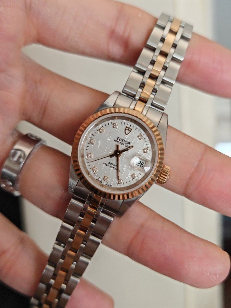 Tudor Princess Date 26mm (Category: Women's Watches) located in San Juan City. Submitted by MW_888 (Listing ID 1464187042, Image 1). Description: Tudor Princess Date 26mm Linen dial with 10P factory diamonds Gold bezel, crown and inner links Ref 92413 9/10 condition Inclusions: watch, original bracelet fit to approx 6.5" wrist and watch case *photo reference on 6.5" wrist 110k.
