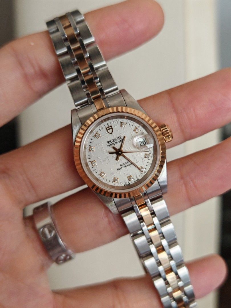 Tudor Princess Date 26mm (Category: Women's Watches) located in San Juan City. Submitted by MW_888 (Listing ID 1464187042, Image 2). Description: Tudor Princess Date 26mm Linen dial with 10P factory diamonds Gold bezel, crown and inner links Ref 92413 9/10 condition Inclusions: watch, original bracelet fit to approx 6.5" wrist and watch case *photo reference on 6.5" wrist 110k.