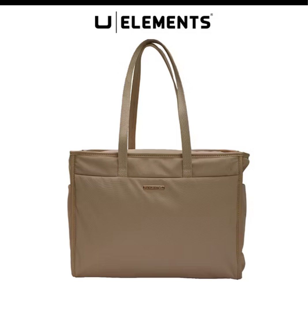 U Elements Beige Tote Bag Laptop Bag (Category: Tote Bags) located in Valenzuela. Submitted by Pinkantshoppe (Listing ID 1464206627, Image 1). Description: - Chic beige U Elements tote bag - Dedicated padded laptop compartment - Multiple interior pockets for excellent organization - Smooth, reliable zippers - Convenient built-in key holder - Ideal for work, school, or everyday adventures.