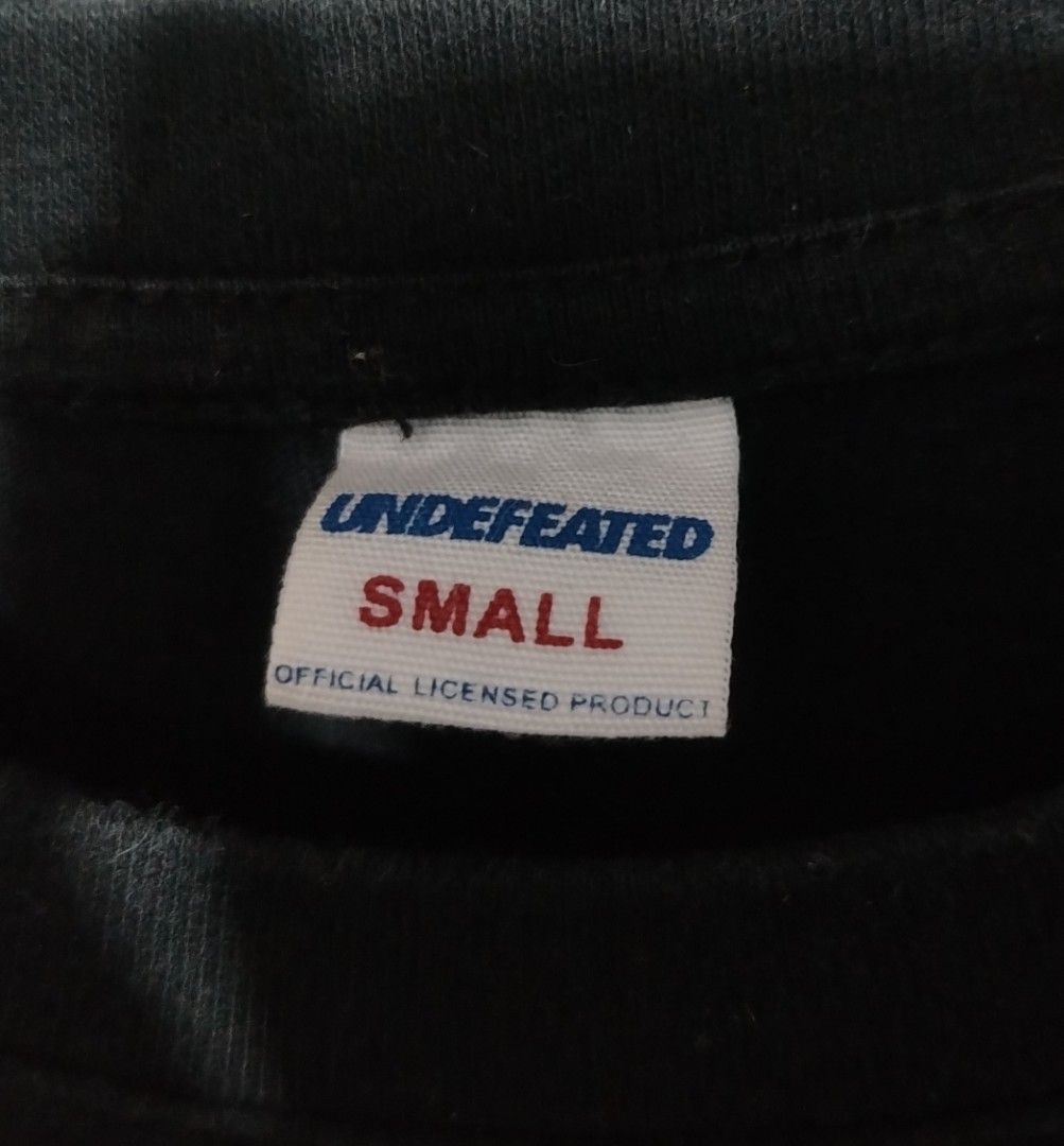 Undefeated (Category: Tshirts & Polo Shirts ) located in Bocaue. Submitted by adrianberi35876 (Listing ID 1464275017, Image 3). Description: Undefeated Width:18.5 Length:25.5 Condition:9/10 Color Rate:9/10 Issue:🚫 (need rewash lang) 📩 📩 📩 📍Bocaue,Bulacan.
