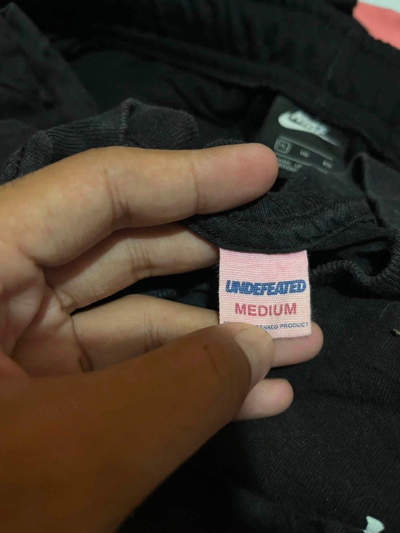 Undefeated Japan shirt (Category: Activewear) located in Manila. Submitted by bibiies2.0xghettothrift (Listing ID 1464141405, Image 3). Description: Undefeated Japan shirt Details W20 L28 Small to med ₱450 Loc.Baclaran Paranaque.
