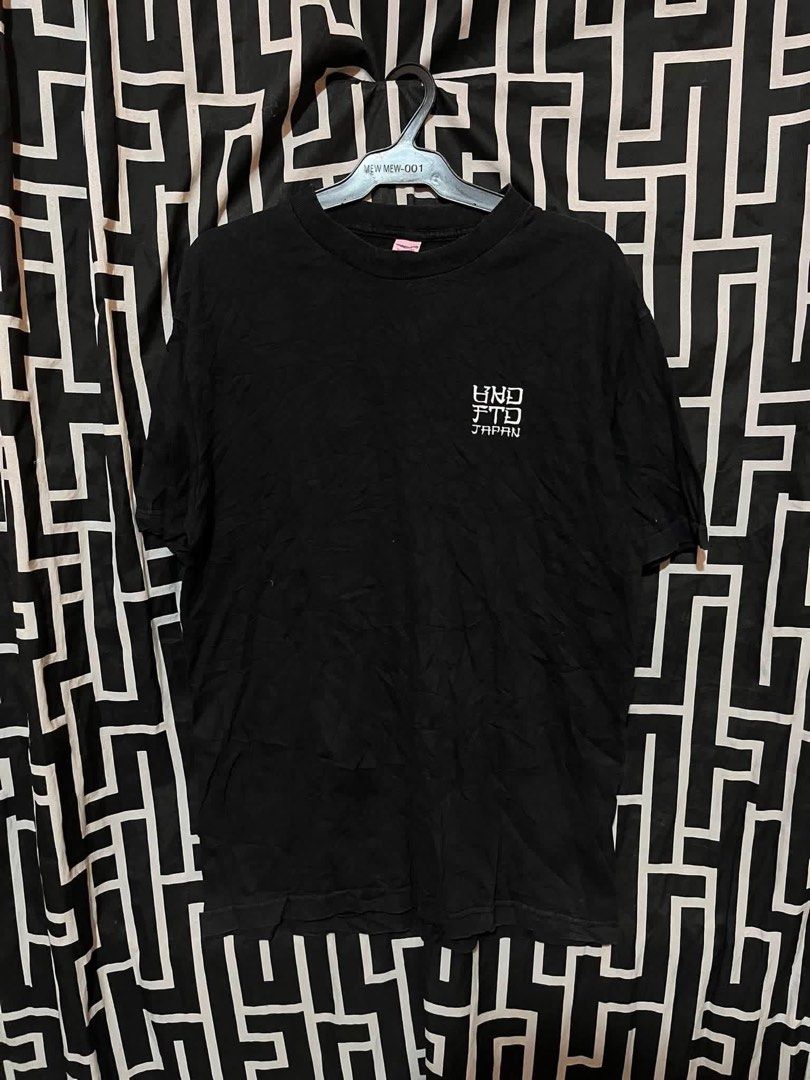 Undefeated Japan shirt (Category: Activewear) located in Manila. Submitted by bibiies2.0xghettothrift (Listing ID 1464141405, Image 1). Description: Undefeated Japan shirt Details W20 L28 Small to med ₱450 Loc.Baclaran Paranaque.