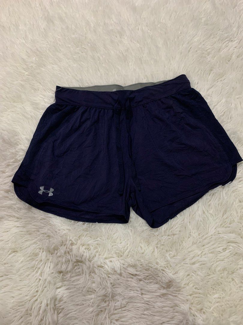 Under Armour Navy Blue Athletic Shorts Size SM (Category: Activewear) located in Iba. Submitted by thriftcoyan (Listing ID 1464237353, Image 1). Description: - Navy blue Under Armour shorts - Size SM -size 28-32 -Length 12 - Adjustable drawstring waist - Lightweight and breathable material - Ideal for running or workouts - Features side panel detail.