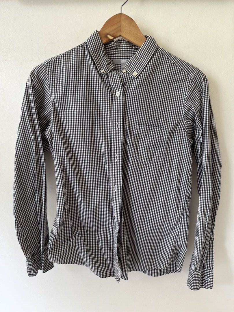 Uniqlo Gingham Button-Down Long Sleeve Shirt (Category: Shirts) located in Quezon City. Submitted by leone.trading (Listing ID 1464180695, Image 1). Description: Uniqlo Button Down Long Sleeve Pattern and color: Gingham Black & White RFS: Decluttering Addiitonal details, Single chest pocket, long sleeves with button cuffs, complete buttons, no discoloration For young professionals on-a-budget that are building their casual or smart-casual outfit.