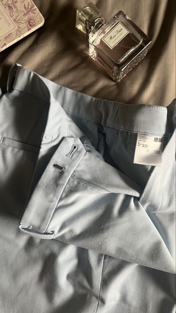 Uniqlo Light Blue Trousers Size M (Category: Jeans) located in Taguig. Submitted by xkmanzano078817 (Listing ID 1464142688, Image 3). Description: 🏷️ Selling at more than 60%off its price with some small lints sa may bottom but not noticeable naman when worn; good for office wear Needs ironing lang per picture Seller’s Size (usually medium) Waist: 28in Bust: 33in RFS: decluttering to make space for new items/ I don’t use these anymore. Feel free