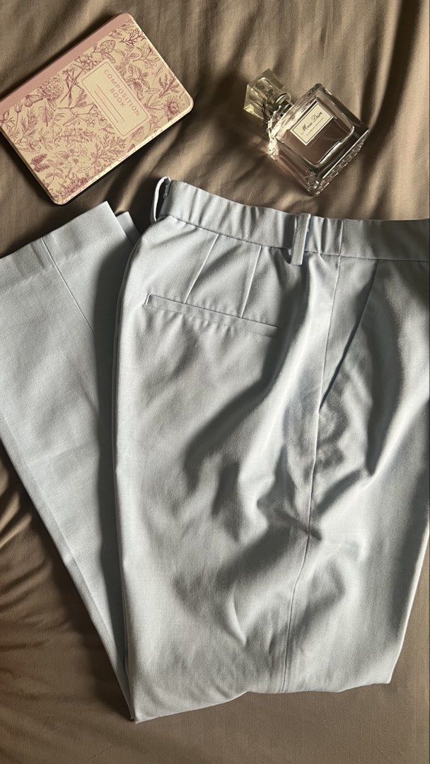 Uniqlo Light Blue Trousers Size M (Category: Jeans) located in Taguig. Submitted by xkmanzano078817 (Listing ID 1464142688, Image 1). Description: 🏷️ Selling at more than 60%off its price with some small lints sa may bottom but not noticeable naman when worn; good for office wear Needs ironing lang per picture Seller’s Size (usually medium) Waist: 28in Bust: 33in RFS: decluttering to make space for new items/ I don’t use these anymore. Feel free