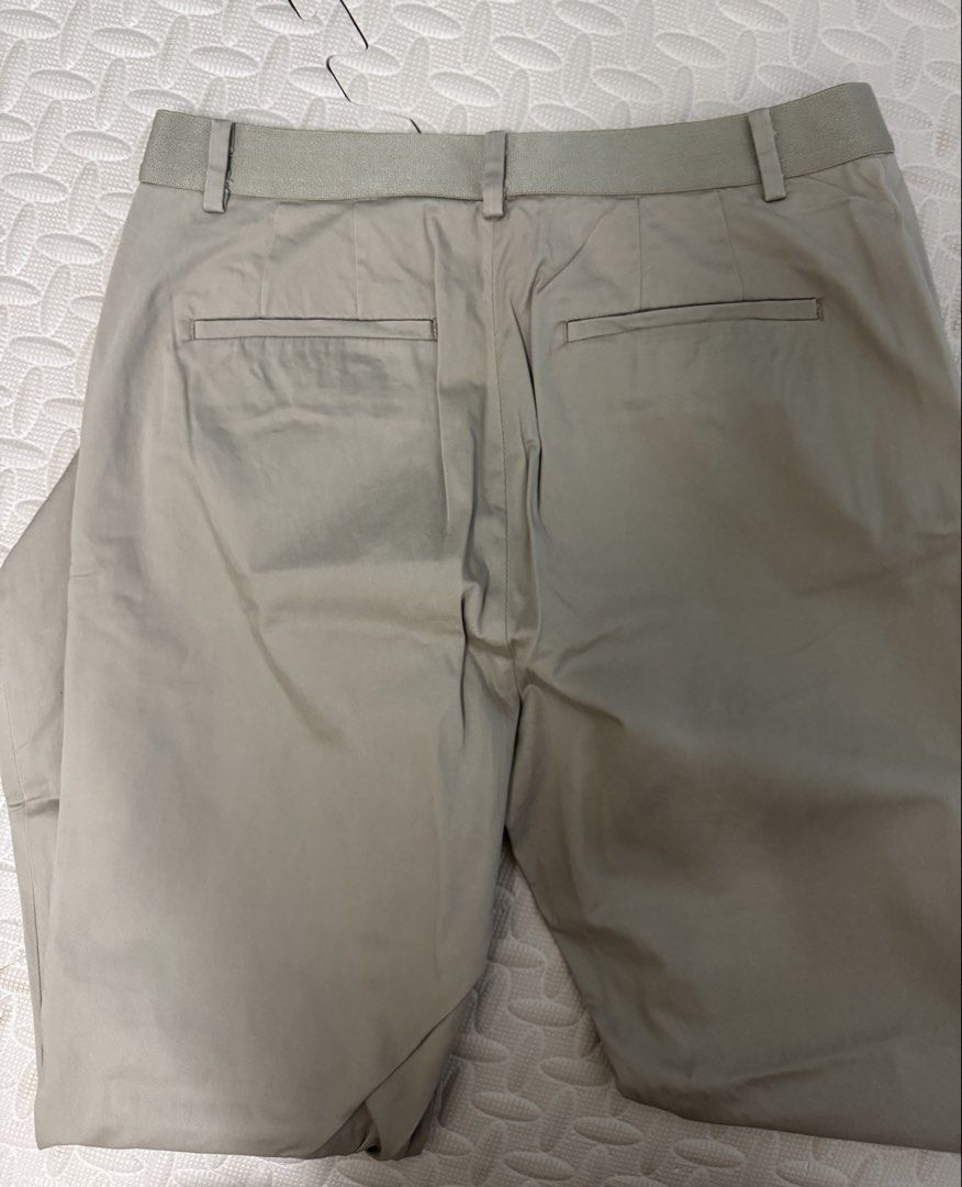 Uniqlo Smart Ankle Pants Garterized Beige Large (Category: Other Bottoms) located in Makati City. Submitted by rarebs (Listing ID 1464150898, Image 3). Description: - Uniqlo Beige/khaki Pants - Size: L - Waist: 69-75cm - Hip: 94-100cm - Material: Comfortable Cotton Blend - Garterized no zipper.