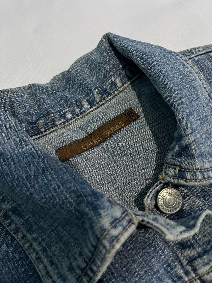 Upper Freak Classic Medium Wash Denim Trucker Jacket (Fits Small to Medium) (Category: Coats, Jackets and Outerwear) located in Calapan. Submitted by shop_storeal (Listing ID 1464207668, Image 3). Description: Brand: Upper Freak Size: Fits Small to Medium (fitted trucker style) Dimes: 22.5L, 17W, 23in sleeves Condition: Gently Used / Great Condition Flaws: Natural light denim fading/whiskering; no visible holes, tears, or missing metal buttons. M