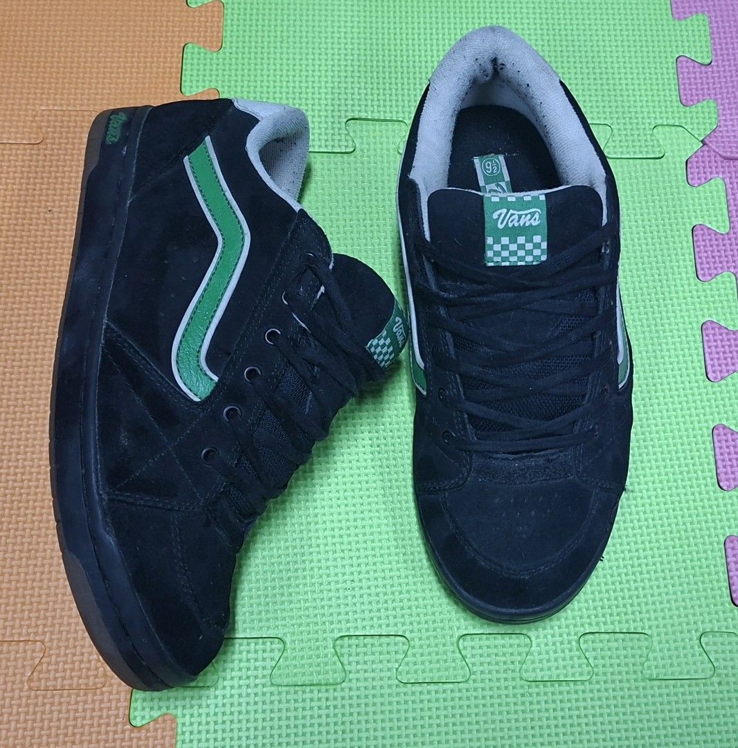 Vans Trainers (Size 8US) (Category: Sneakers) located in Manila. Submitted by declutrredgoods (Listing ID 1464285228, Image 1). Description: - Vans Skate Shoes - Color: Black Suede with Green Stripe Detail - Size: 8 - Features: Good grip sole pattern - Condition: Pre-owned, still plenty of life left - Ideal for: Skating or casual wear.