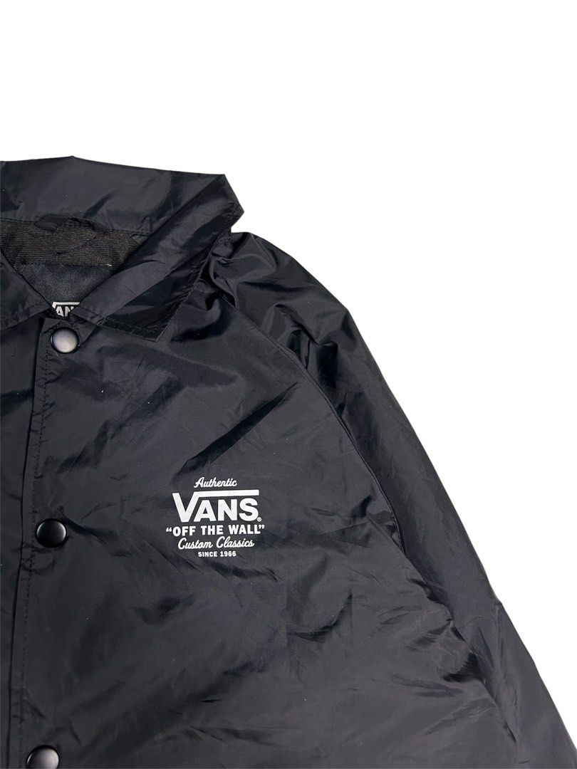 Vans "Off The Wall" Custom Classics Coach Jacket Black Medium (Category: Coats, Jackets and Outerwear) located in Dasmarinas. Submitted by insaurigaj60770 (Listing ID 1464315845, Image 3). Description: - Black Vans Coach Jacket - Features "Off The Wall" Custom Classics logo on chest - Snap button closure - Drawstring at the hem - Made in China - Size Medium.