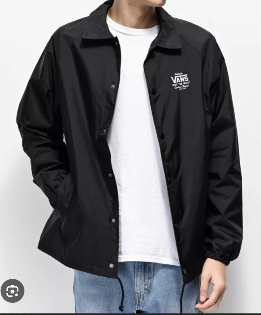 Vans "Off The Wall" Custom Classics Coach Jacket Black Medium (Category: Coats, Jackets and Outerwear) located in Dasmarinas. Submitted by insaurigaj60770 (Listing ID 1464315845, Image 1). Description: - Black Vans Coach Jacket - Features "Off The Wall" Custom Classics logo on chest - Snap button closure - Drawstring at the hem - Made in China - Size Medium.