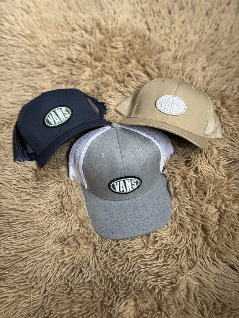 Vans Trucker Caps - Navy, Tan, Grey (Category: Caps & Hats) located in Quezon City. Submitted by nojthrift (Listing ID 1464252366, Image 1). Description: - Set of 3 Vans trucker caps - Colors: Navy, Tan, Grey (with white mesh) - Features classic oval Vans logo patch - Ideal for casual wear or completing a streetwear look - Selling as a set 500 each 1400 freeship for take all.