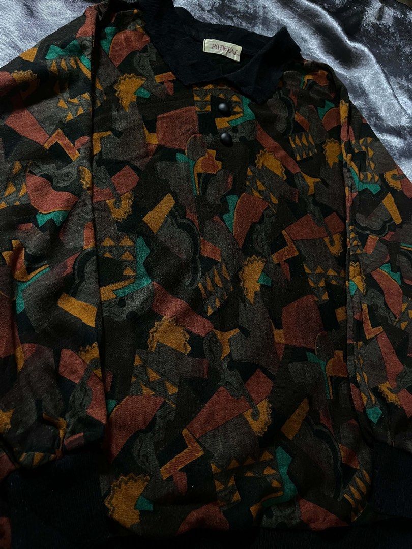 Vintage Abstract Print Button Neck Sweater (Category: Coats, Jackets and Outerwear) located in General Trias. Submitted by kevinthriftshop (Listing ID 1464286157, Image 2). Description: - Unique vintage sweater - Abstract print - Button-up neckline - Comfortable fit - Earthy tones with teal and orange accents - Perfect for layering or standalone wear.