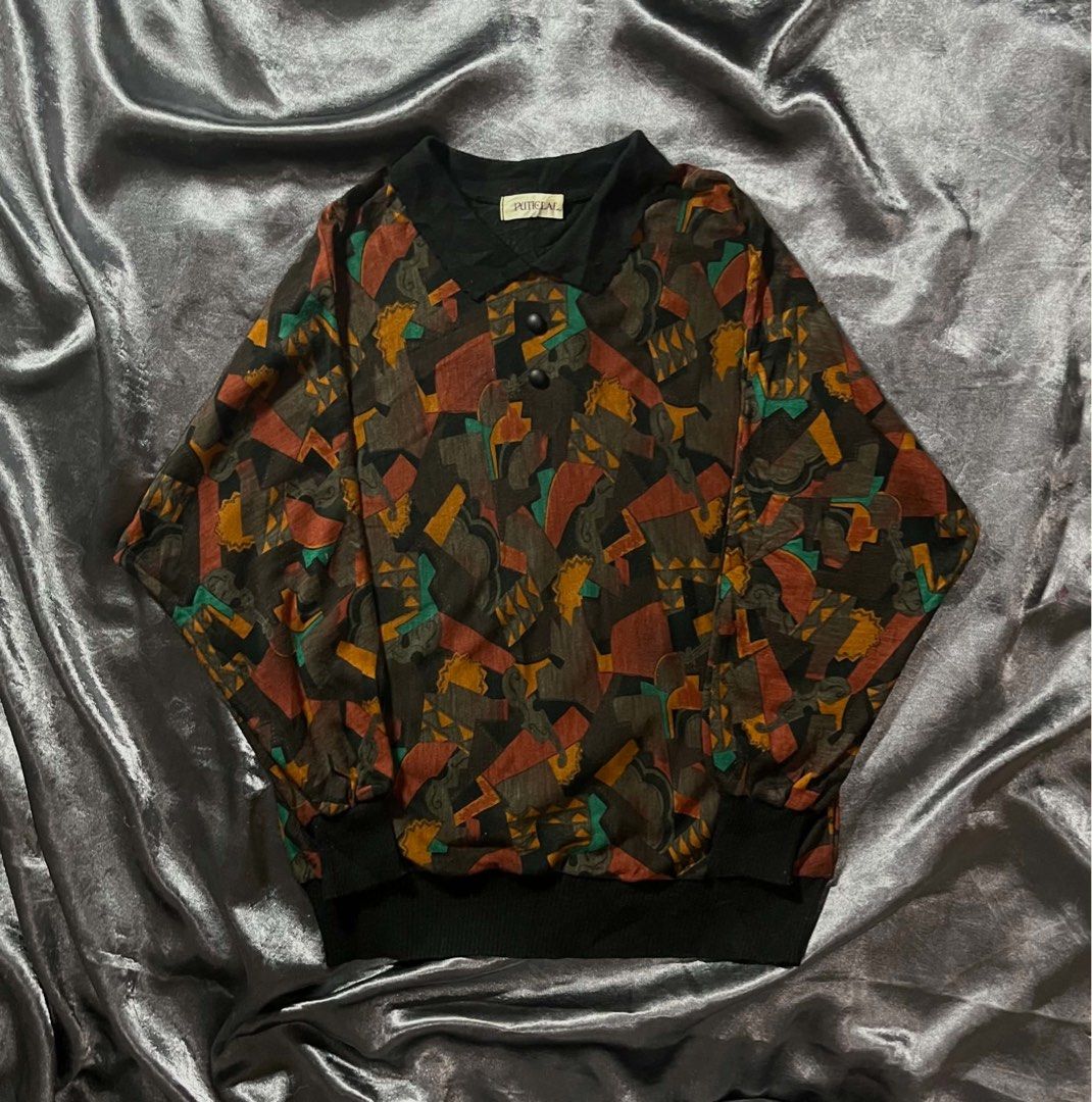 Vintage Abstract Print Button Neck Sweater (Category: Coats, Jackets and Outerwear) located in General Trias. Submitted by kevinthriftshop (Listing ID 1464286157, Image 1). Description: - Unique vintage sweater - Abstract print - Button-up neckline - Comfortable fit - Earthy tones with teal and orange accents - Perfect for layering or standalone wear.