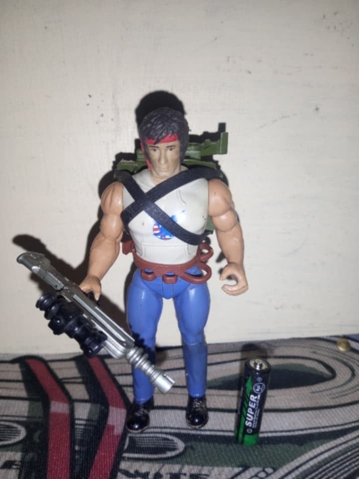 Vintage Action Figure with Accessories (Category: Action & Battle Toys) located in Manila. Submitted by mysticriver.bbd2c5 (Listing ID 1464159619, Image 1). Description: - Vintage Rambo action figure - Features red bandana and blue pants - Comes with weapon accessory - Includes backpack accessories - Ideal for action figure collectors.