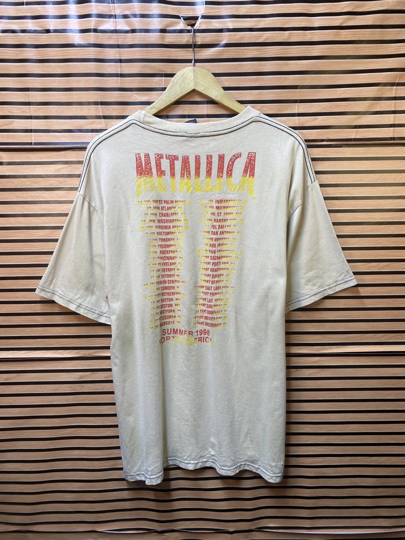 vintage beige Metallica "False Perception" graphic tee (Category: Tshirts & Polo Shirts ) located in Makati City. Submitted by drip.poww (Listing ID 1464229929, Image 2). Description: - Authentic Metallica Ny Giant - Color: Beige - Size: XL - Dimes: 24x28 - Authentic - Excellent condition - Need wash, fresh from bale - Material: 100% Cotton Please don’t expect too much—these are thrifted (ukay) items. 😊 !!STILL NEGOTIABLE!!.