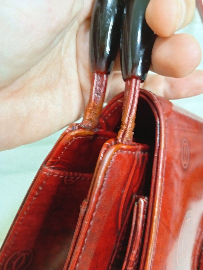 Vintage Cartier Monogram Shoulder Bag (Category: Shoulder Bags) located in Las Pinas. Submitted by etoksi1234 (Listing ID 1464200966, Image 3). Description: Pre-loved vintage Cartier "Happy Birthday" burgundy patent leather shoulder bag featuring an all-over debossed double-C logo pattern and a flap closure with a centered hardware clasp. .