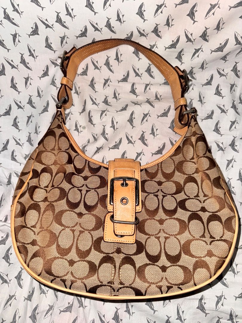 Coach Hobo bag (Category: Luxury Bags & Wallets) located in Dumaguete. Submitted by luxxe_babe (Listing ID 1464138762, Image 1). Description: A vintage Coach Soho Signature Buckle Hobo / Crescent Shoulder Bag (Style 6363) crafted in a brown and tan monogram canvas with tan leather trim. .
