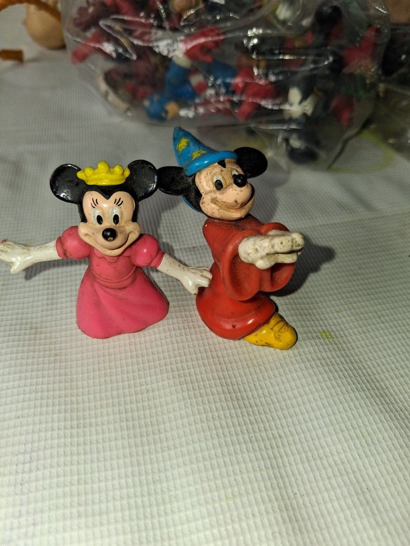 Vintage Disney Mickey & Minnie Mouse Figurines (Category: Figurines & Statues) located in Manila. Submitted by marcas022798212 (Listing ID 1464147355, Image 3). Description: - Vintage Mickey & Minnie Mouse figurines - Mickey: Sorcerer hat & red outfit - Minnie: Pink dress & crown - Classic Disney collectibles - Ideal for Disney fans' collections.