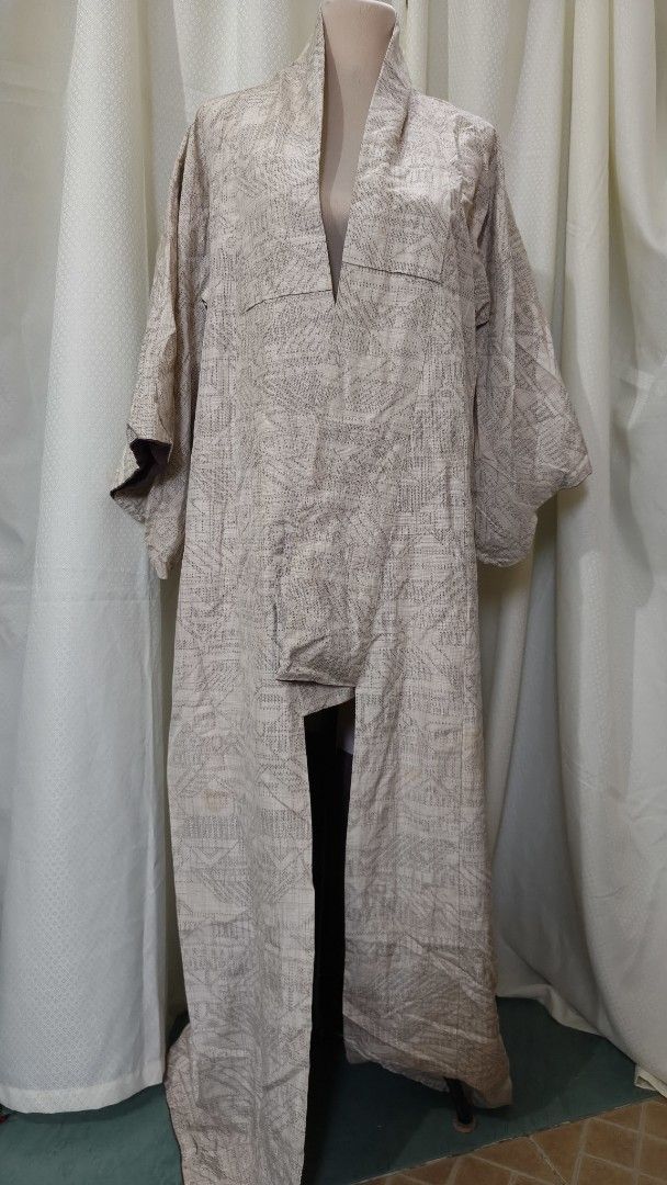 Vintage Japanese Kimono Robe - Beige Geometric Pattern (Category: Dresses) located in Taguig. Submitted by ymicloset (Listing ID 1464228582, Image 1). Description: - Authentic Japanese kimono robe - Beige and black all-over geometric pattern - Lightweight fabric, ideal for layering or as a statement piece - Contrasting cream inner lining - Great for cosplay or unique fashion - Approximately 50 inches in length -Shoulder 24 1/2 in -Waist 49 in - S