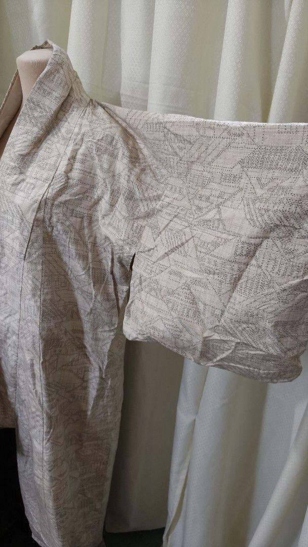 Vintage Japanese Kimono Robe - Beige Geometric Pattern (Category: Dresses) located in Taguig. Submitted by ymicloset (Listing ID 1464228582, Image 2). Description: - Authentic Japanese kimono robe - Beige and black all-over geometric pattern - Lightweight fabric, ideal for layering or as a statement piece - Contrasting cream inner lining - Great for cosplay or unique fashion - Approximately 50 inches in length -Shoulder 24 1/2 in -Waist 49 in - S