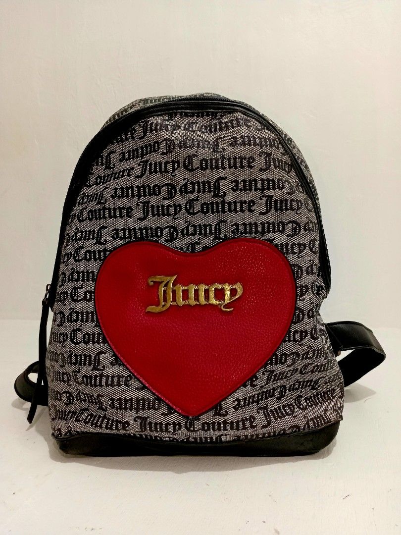 Juicy Couture OG Monogram Backpack (Category: Backpacks) located in Navotas City. Submitted by ms.soulana (Listing ID 1464251199, Image 2). Description: PreOwned Lightly Used Authentic Iconic Juicy Couture monogram print backpack - Adorable red heart detail with Juicy Couture logo on the front - Chic black faux leather trim and adjustable straps - Interior lining features the signature Juicy Couture print - Secure zipper closure - Ideal for every