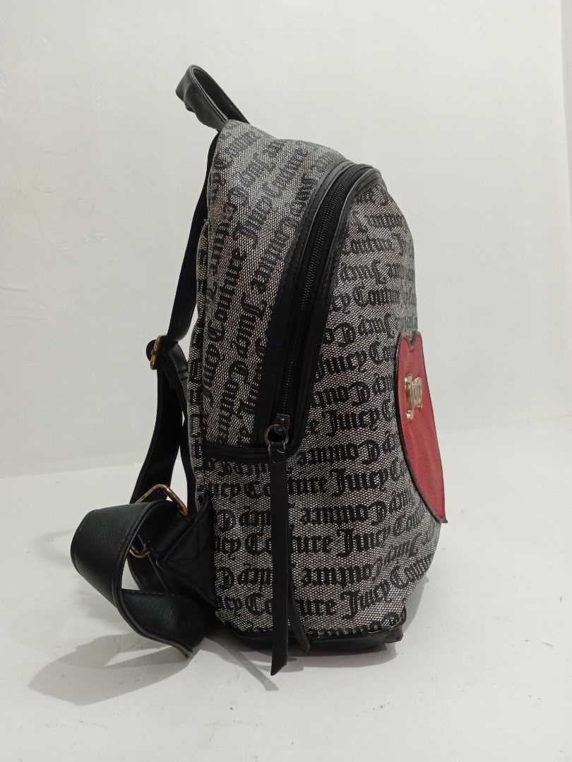Juicy Couture OG Monogram Backpack (Category: Backpacks) located in Navotas City. Submitted by ms.soulana (Listing ID 1464251199, Image 3). Description: PreOwned Lightly Used Authentic Iconic Juicy Couture monogram print backpack - Adorable red heart detail with Juicy Couture logo on the front - Chic black faux leather trim and adjustable straps - Interior lining features the signature Juicy Couture print - Secure zipper closure - Ideal for every