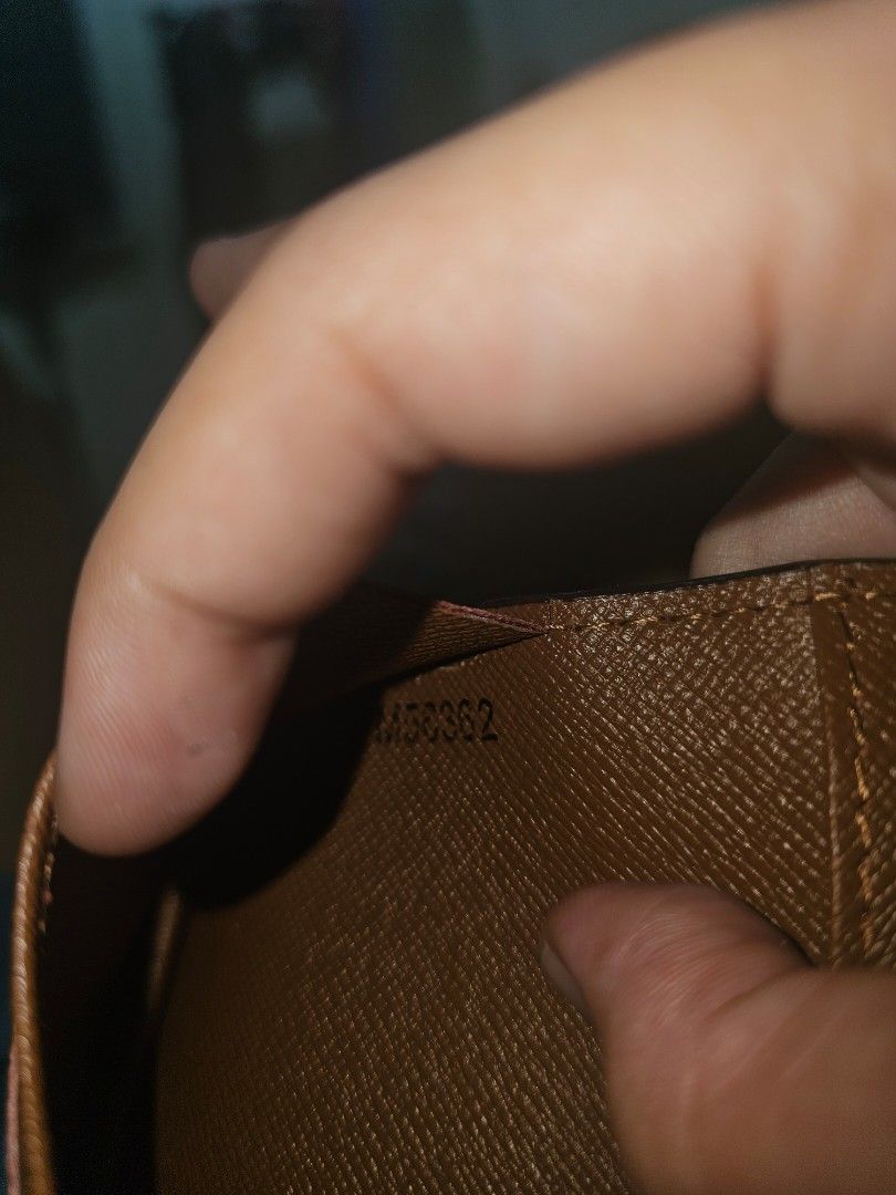 Vintage Louis Vuitton Monogram Card Holder (Category: Wallets & Card holders) located in Antipolo. Submitted by hazyhaze21 (Listing ID 1463072764, Image 3). Description: Vintage Louis Vuitton Monogram Bifold ID / Card Holder, approximately 4.5 × 3.25 inches, made in France around March 2002. - preloved.