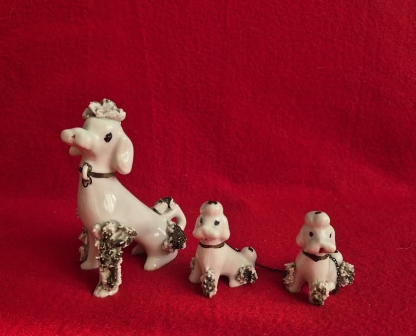 Vintage Poodle Family Set (Category: Vintage Collectibles) located in Makati City. Submitted by maydeleo1 (Listing ID 1464235621, Image 1). Description: Vintage Spaghetti Poodle Family Set 🐩 ✨ Price: PHP 1,200✨ Condition: Vintage / Pre-loved Super cute vintage spaghetti poodle figurine set featuring a mother dog and her two puppies. Perfect for collectors or adding a retro touch to your home decor! RFS Decluttering.