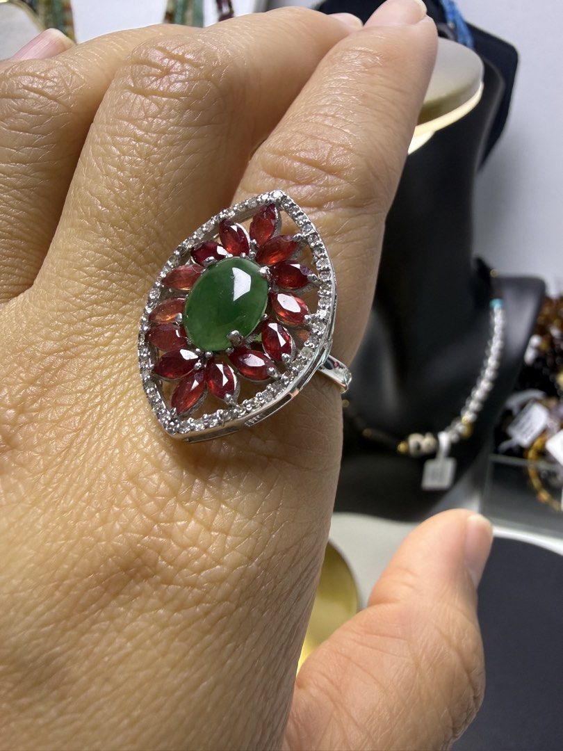 Vintage-Style Gemstone Cluster Ring S7 (Category: Rings) located in Baguio. Submitted by mooi.kuryba (Listing ID 1464352736, Image 2). Description: Vintage-Style Gemstone Cluster Ring ✨ This stunning ring showcases a unique marquise (navette) design. At its center is a beautiful oval cabochon of Jadeite Jade, surrounded by an inner halo of faceted marquise-cut natural rubies and an outer halo of sparkling natural diamonds. It’s a true testament t