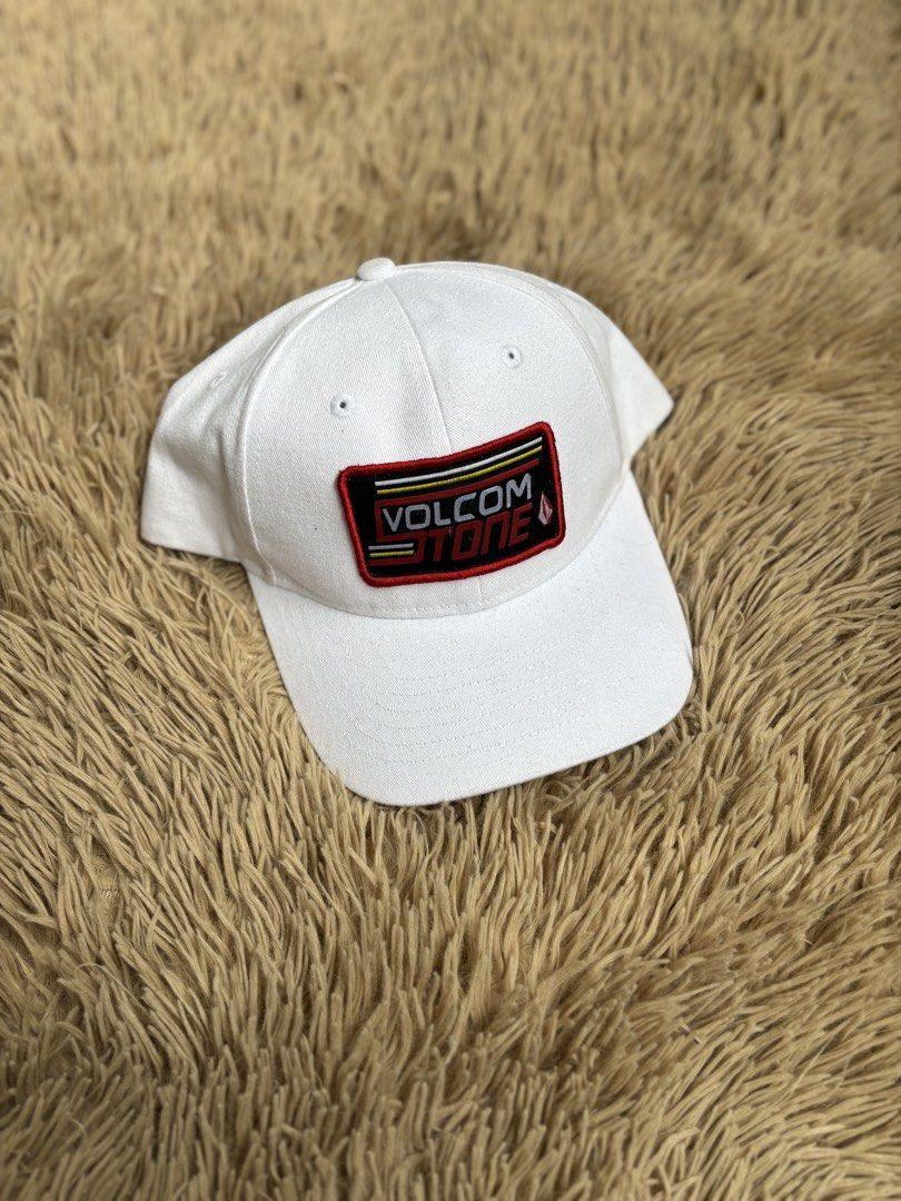 Volcom Stone White Baseball Cap (Category: Caps & Hats) located in Quezon City. Submitted by nojthrift (Listing ID 1464252239, Image 1). Description: - Classic white Volcom Stone cap - Features iconic Volcom Stone logo patch on the front - Adjustable strap at the back for a customized fit - One size fits most - Ideal for daily wear and completing a streetwear outfit - Clean and versatile design 550.