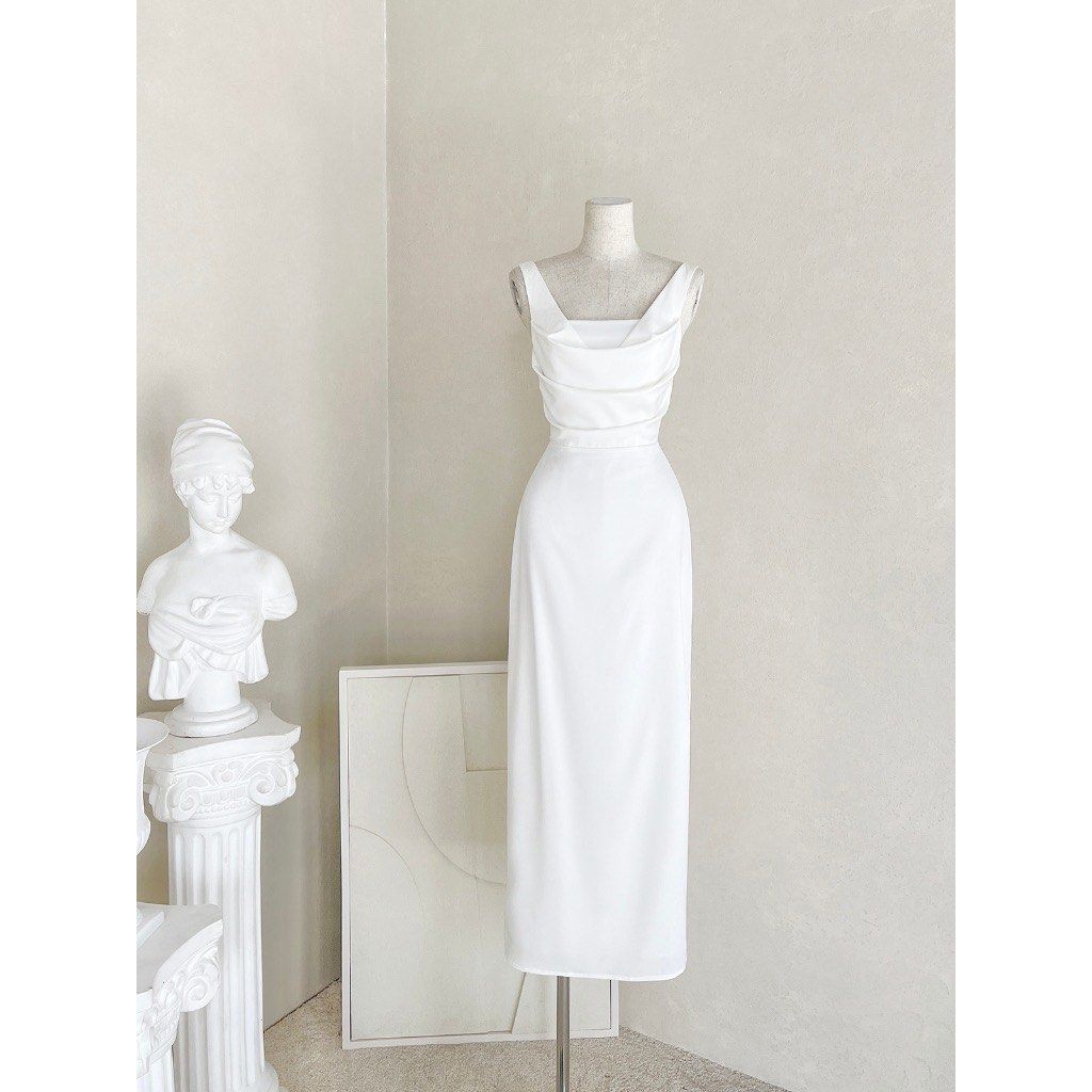 White Cowl Neck Midi Dress (Category: Dresses) located in Las Pinas. Submitted by withlovekai (Listing ID 1464266287, Image 1). Description: - Elegant white midi dress - Features a sophisticated cowl neckline - Fitted waist for a flattering silhouette - Classic straight-cut skirt - Versatile for events, parties, formal occasions, or a night out - Effortlessly dress up or down - RFS: Worn once, no longer fits. Willing to negotiate price.