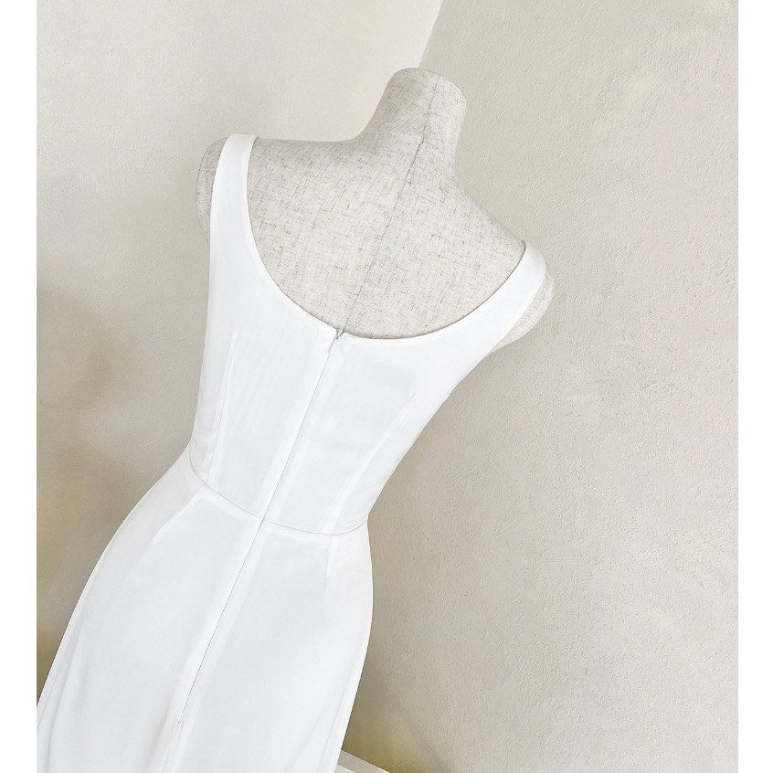 White Cowl Neck Midi Dress (Category: Dresses) located in Las Pinas. Submitted by withlovekai (Listing ID 1464266287, Image 2). Description: - Elegant white midi dress - Features a sophisticated cowl neckline - Fitted waist for a flattering silhouette - Classic straight-cut skirt - Versatile for events, parties, formal occasions, or a night out - Effortlessly dress up or down - RFS: Worn once, no longer fits. Willing to negotiate price.