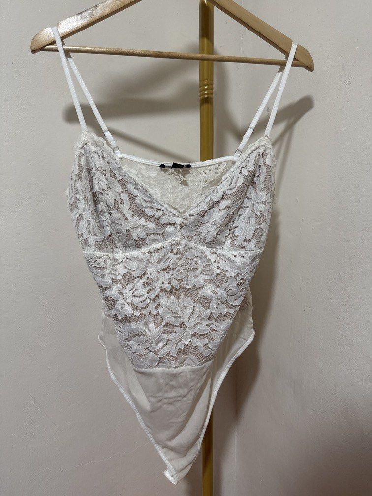 White Laced Bodysuit (Category: Others Tops) located in Mexico. Submitted by studioleraph (Listing ID 1464236812, Image 1). Description: 🛍️ Perfect for your personal wardrobe 🫶 👗 The actual item being sold is the original garment shown in the product photos. Small differences in fit, drape, color, texture, or details may occur. 💌 Condition: • Preloved; Please wash the items before wearing. • Please manage expectations as these are vintage/pre