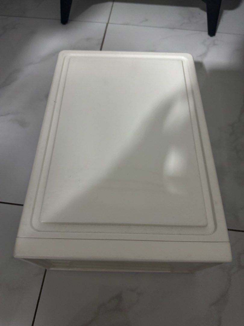 White Plastic Storage Drawer Organizer (Category: Storage Boxes & Baskets) located in Manila. Submitted by decluterthings888 (Listing ID 1464339286, Image 1). Description: - White plastic storage drawer - Multiple compartments inside for organizing small items - Ideal for desk or vanity organization - Clean and simple design.