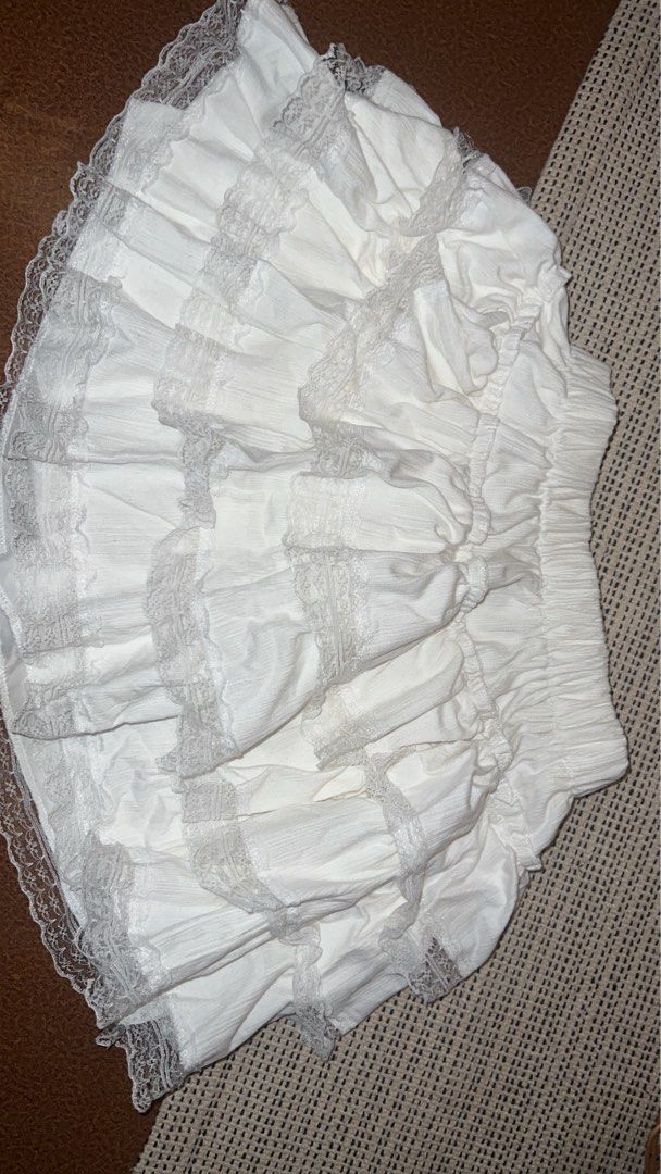 White skirt with Lace (Category: Skirts) located in Pasig City. Submitted by shop.prelovedbycza (Listing ID 1464280193, Image 3). Description: -Free size (XS-M) -Shipping must be shouldered by buyer -Loc: Pasay City.