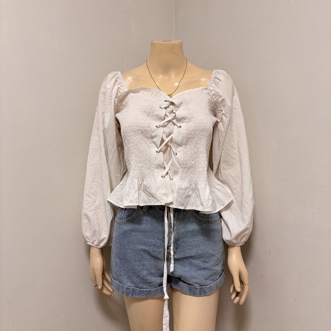 White Smocked Corset Top with Puff Sleeves (Category: Blouses) located in Imus. Submitted by reloved.nd (Listing ID 1464261044, Image 1). Description: m-l.