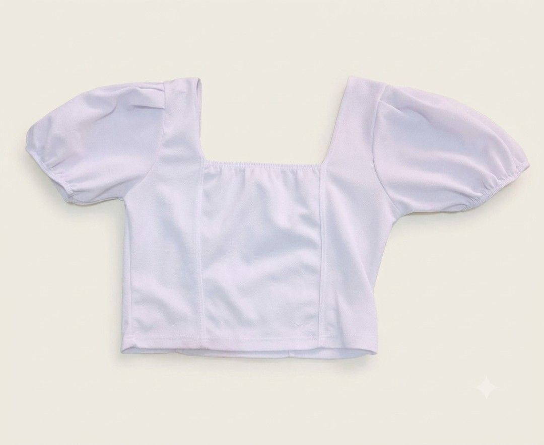 White Square Neck Puff Sleeve Crop Top (Category: Others Tops) located in Manila. Submitted by jules_preloved (Listing ID 1464337187, Image 1). Description: - Adorable white crop top - Features cute puff sleeves - Flattering square neckline - Made with stretchy material for comfort - Versatile: dress up or down - Easily pairs with jeans, skirts, and more!.