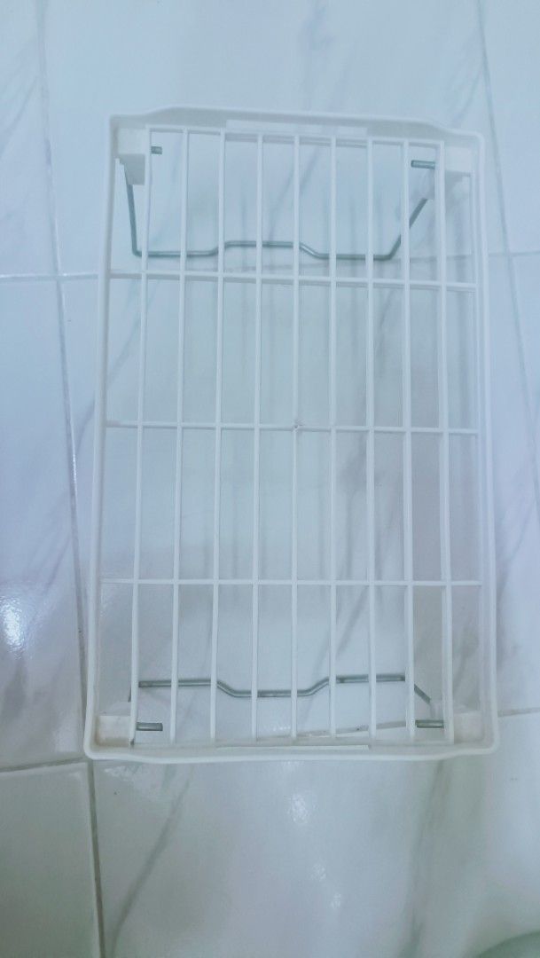 White Stackable Storage Rack Shelf Unit (Category: Shelves, Cabinets & Racks) located in Subang Jaya. Submitted by nadia_anessa (Listing ID 1464246103, Image 2). Description: - Stackable white plastic storage rack - Grid pattern on each shelf - Perfect for organizing items at home or in the office - Versatile for various storage needs ‼️Take all (25pcs) RM40 only‼️ .