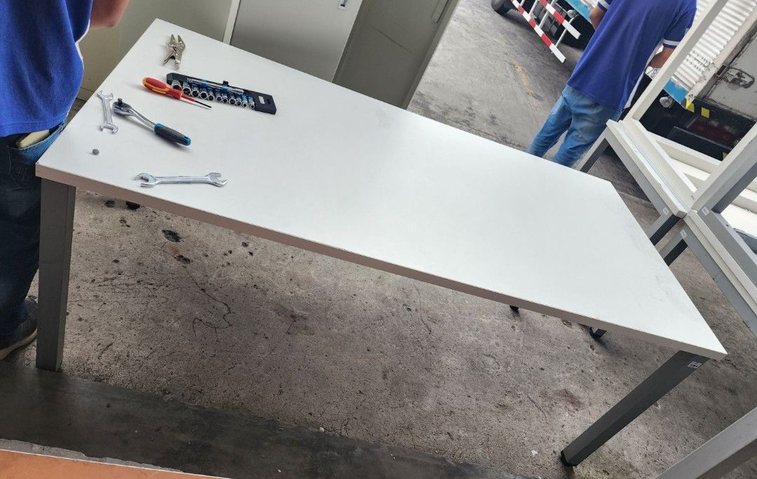 White Table with Metal Legs (Category: Tables & Sets) located in Cainta. Submitted by christine07. (Listing ID 1464354221, Image 2). Description: - White table with sturdy metal legs - Good size for work or study - Smooth, easy-to-clean surface - Multiple tables available - Great for office or home use - Pick up only.
