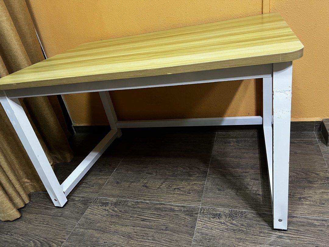 Solid wood table (Category: Tables & Sets) located in Singapore. Submitted by danlim88 (Listing ID 1464352853, Image 3). Description: - Light wood grain finish - Natural wood pattern surface - Rounded edges - Ideal for desks, small tables, workspaces, or craft areas - 1.2m by 0.8m by 0.74m high .
