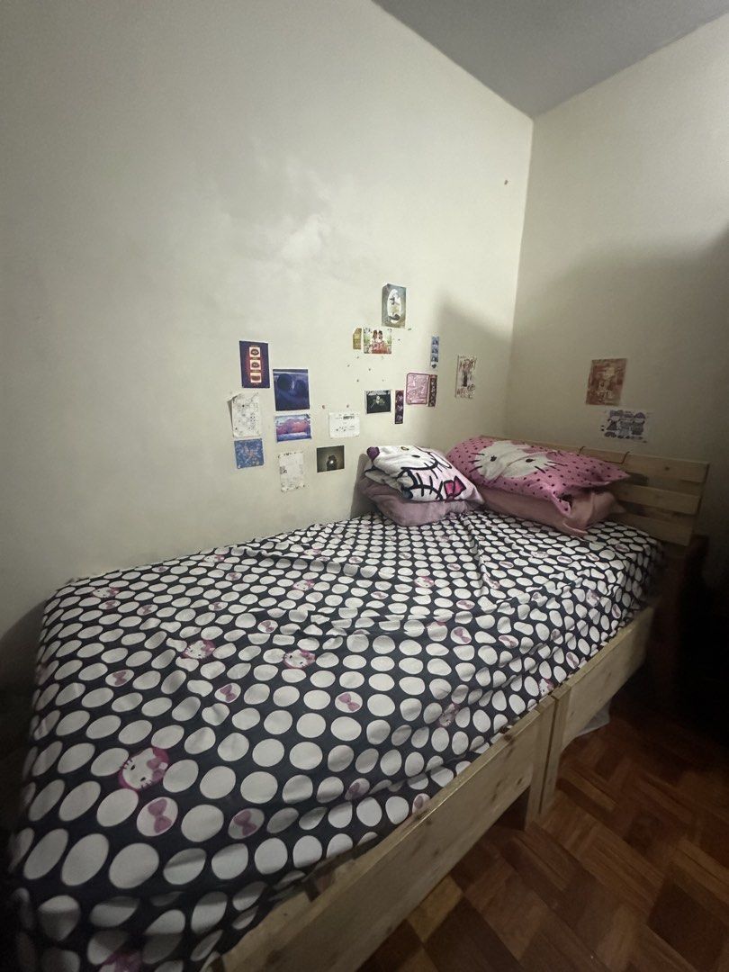 Wooden Single Bed Frame with Headboard (Category: Bed Frames & Mattresses) located in Quezon City. Submitted by inamocha (Listing ID 1464234027, Image 2). Description: - Solid wood single bed frame - Includes headboard - Slatted base for mattress support - Simple and sturdy design - Ideal for bedrooms or guest rooms - Mattress not included - Ready for pickup W 39 in L 78 in H 14.5 in.