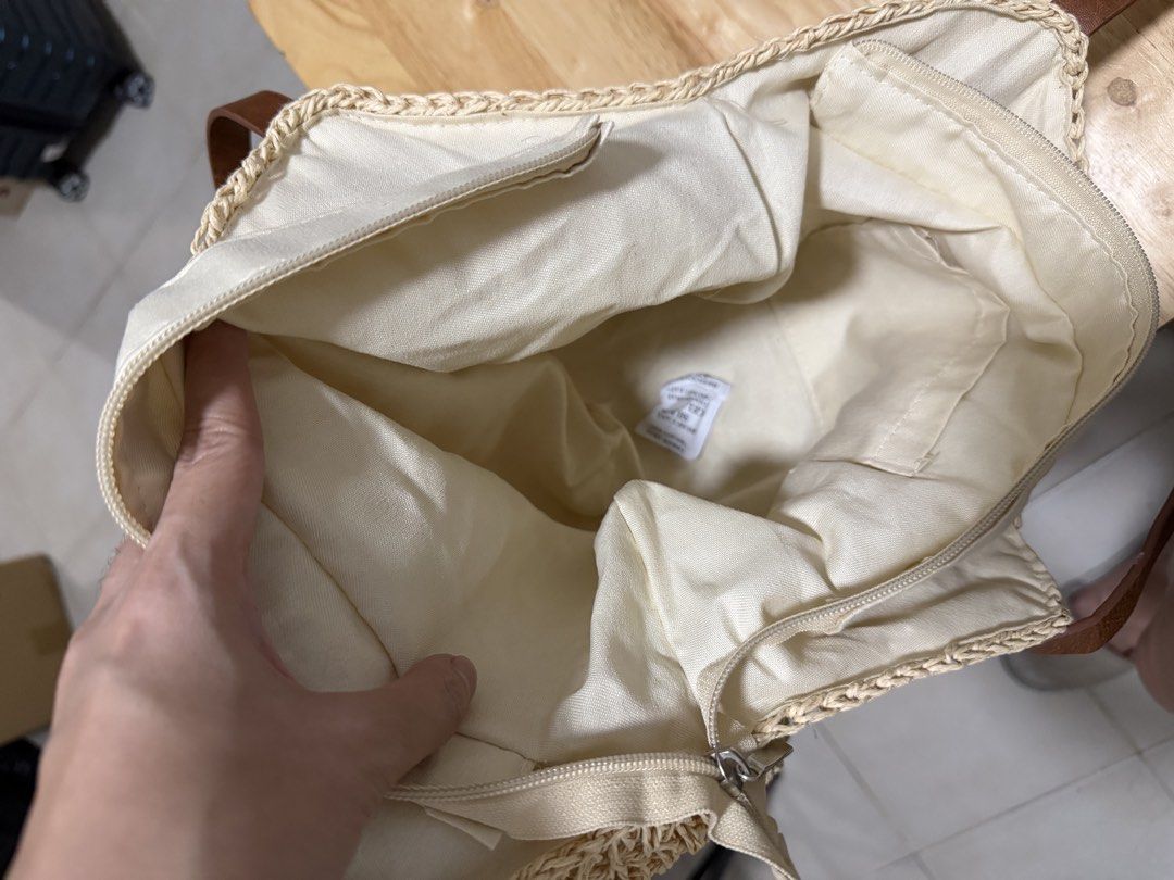 Woven Straw Tote Bag with Leather Straps (Category: Beach Bags) located in Makati City. Submitted by boojam (Listing ID 1464190432, Image 3). Description: Has Zipper closure at the top. Great for beach trips or everyday use. Spacious enough to carry your essentials..